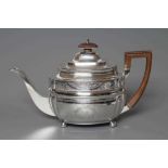 A GEORGE III SILVER TEAPOT, maker Charles Fox, London 1806, of lobed oblong form raised upon four