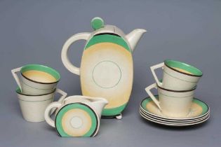 AN ART DECO CLARICE CLIFF WILKINSON POTTERY BONJOUR PART COFFEE SERVICE, with green, yellow and