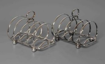 A PAIR OF EDWARDIAN SILVER FIVE BAR TOASTRACKS, maker's mark GH, Sheffield 1906, the kidney shaped