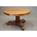 A VICTORIAN MAHOGANY CENTRE TABLE, the moulded edged circular tilt top on triangular stem concave