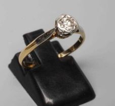 A SOLITAIRE DIAMOND RING, the round brilliant cut stone of approximately 0.20cts illusion set to a