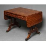 A REGENCY MAHOGANY SOFA TABLE, early 19th century, the rounded oblong top over two frieze drawers