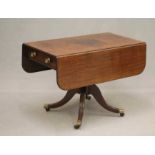 A MAHOGANY PEMBROKE TABLE, early 19th century, the reeded edged rounded oblong top over frieze