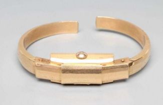 A TELOR BANGLE WATCH, the oblong silvered dial with applied gilt metal even Arabic numerals and