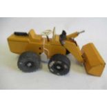 A Steiff wood and metal yellow digger, rubber tyres with operating steering and shovel, F-G (Est.