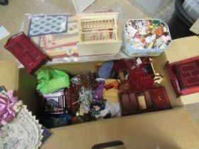 A large box of dolls house furniture and accessories, including mainly wooden furniture, a metal