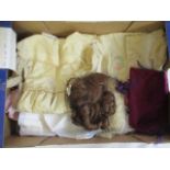 A collection of good quality dolls clothing and a brown wig for a 15" head (Est. plus 24% premium