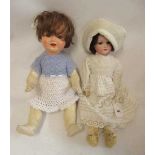 Two bisque socket head German dolls, comprising an Armand Marseille 390 girl, with brown glass