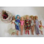 A collection of Barbie and Sindy dolls, including three barbies with Mattel 1966 marks, one glam