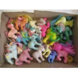 A collection of My Little Pony figures, comprising three stamped for 1982, five for 1983, two and