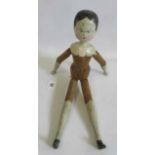 A large Victorian peg doll, of all wood construction with painted face and hair, painted lower
