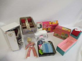 A collection of Sindy accessories, comprising an 033055x doll, a boxed Sindy bath time tub (with