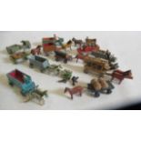 Small German made wooden farm figures by Erzgebirge including horse drawn carts, drivers and motor