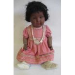 An Armand Marseille character doll, with brown glass sleeping eyes, open mouth, two top teeth,
