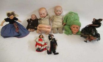 A collection of dolls, including three Armand Marseille bisque head baby dolls, all with sleeping