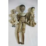 Three Victorian peg dolls, comprisiong one 11 1/4" jointed doll with painted features and dress, one