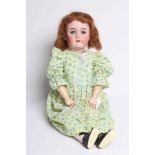 A Heinrich Handwerck bisque socket head doll, with blue glass sleeping eyes, open mouth, applied