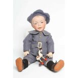 An S.F.B.J. bisque head character boy doll, with blue glass fixed eyes, moulded open mouth,