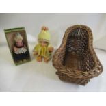 Wicker dolls crib, together with a boxed Dovina Dutch doll and a vintage baby (3) (Est. plus 24%