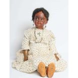 A Simon & Halbig bisque socket head flirty doll, with brown glass sideways glancing eyes, open