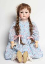 A Kammer & Reinhardt bisque socket head doll, with brown glass sleeping eyes, open mouth, applied