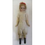 An early bisque head doll, possibly French, with bisque head, brown glass fixed eyes, blond wig,