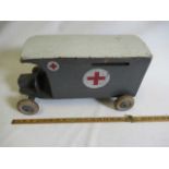 Early 20th century wooden push-a-long ambulance finished in grey/white with opening back doors and