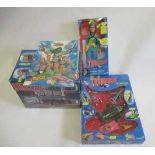 Carlton Thunderbirds vehicle set, Virgil Tracy doll and Coin Collector board, together with a