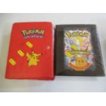 Two Pokemon card collection folders, part filled with 206 Pokemon cards including Japanese