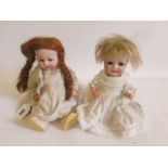 Two Heubach bisque socket head 10537 dolls, comprising one 11 1/2" doll and one 10 1/2", both with