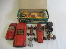 Playworn tin cars by Schuco and others including Mercedes and race cars and a Gama battery