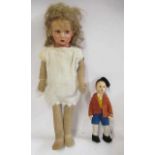 Two cloth dolls, comprising an 8 1/2" Lenci boy doll in original outfit, together with a 17 1/2"