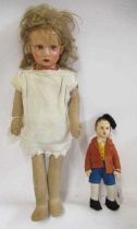 Two cloth dolls, comprising an 8 1/2" Lenci boy doll in original outfit, together with a 17 1/2"