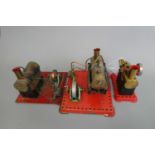 Three Mamod stationary engines comprising Minor 1 (repainted) and two SE1 single cylinder engines,