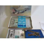 Two Tamiya kits comprising 1/48 scale Swordfish and 1:32 scale F14A Tomcat, boxed in plastic bags,