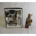 A clockwork drumming/walking cat, (clockwork motor ok) and a battery operated TOMY robot, F (Est.