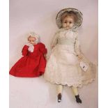 Two Victorian wax shoulder head dolls, one 18 1/2" with brown glass fixed eyes, closed mouth,