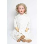 A Kammer & Reinhardt bisque socket head doll, with blue glass sleeping eyes, open mouth, applied