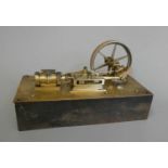 Brass stationary mill type engine on cast iron base marked Made 1890 by C. Baker, Edenbridge,