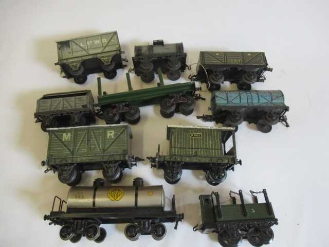 Gauge 1 goods rolling stock by Bing and others including tank wagons, covered vans and brake van,