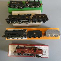 Four kit built locomotives comprising L.M.S. 2031 0-6-2T, B.R. 7F 0-8-0, L.M.S. 4-4-0 SP and MR 0-
