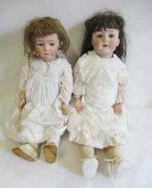 Two restored Gebruder Heubach bisque socket head dolls, comprising one 28" 8192 and one 23" 7248,