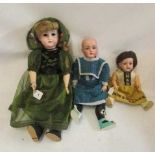 Three bisque socket head dolls, comprising a 24" Adolf Wislizenus doll with blue glass sleeping eyes