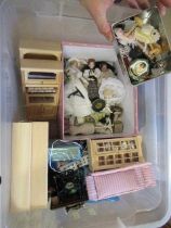 A box of dolls house furniture, including wooden furniture, two metal and wood construction sewing