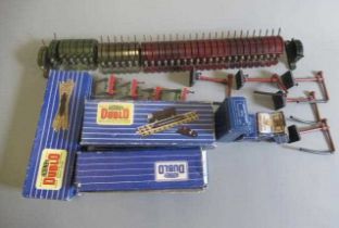 Hornby Dublo 3-rail track and accessories including thirty six point and signal switch levers,
