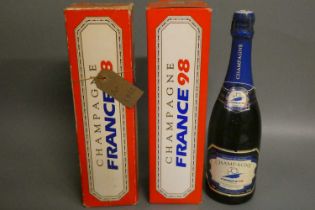 3 bottles France 98 Champagne, two boxed (Est. plus 24% premium inc. VAT) Condition Report: