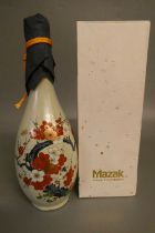 1 ceramic bottle of Mazak Saki, with floral design, boxed (Est. plus 24% premium inc. VAT) Condition