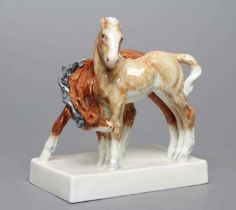 "FOALS" - A ROYAL WORCESTER CHINA GROUP, 1954, modelled by Doris Lindner, on an oblong base, printed