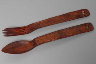 A VICTORIAN WELSH TREEN LOVE SPOON AND FORK, 1882, both with a chip carved inscription "Madam