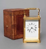 A BRASS CARRIAGE CLOCK, early 20th century, the twin barrel movement with platform escapement